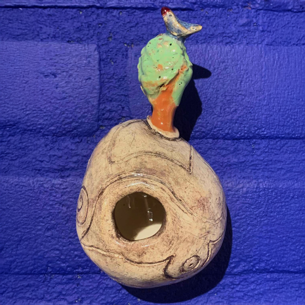 keramieken ring met een vogel